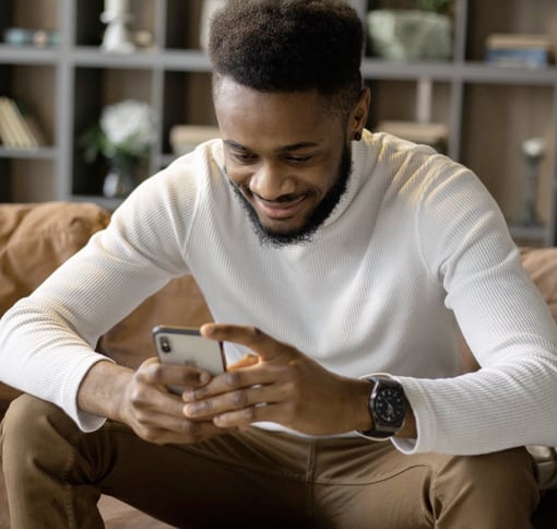 man on a video call and he is smiling